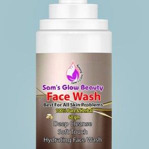 Sam’s Glow Beauty Facewash bottle on a natural stone surface surrounded by fresh herbs.