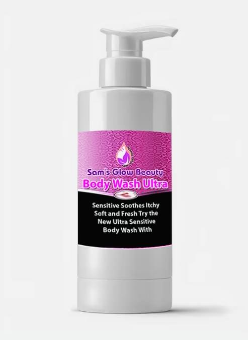 Sam's Glow Beauty Body Wash bottle on a marble countertop surrounded by natural ingredients.